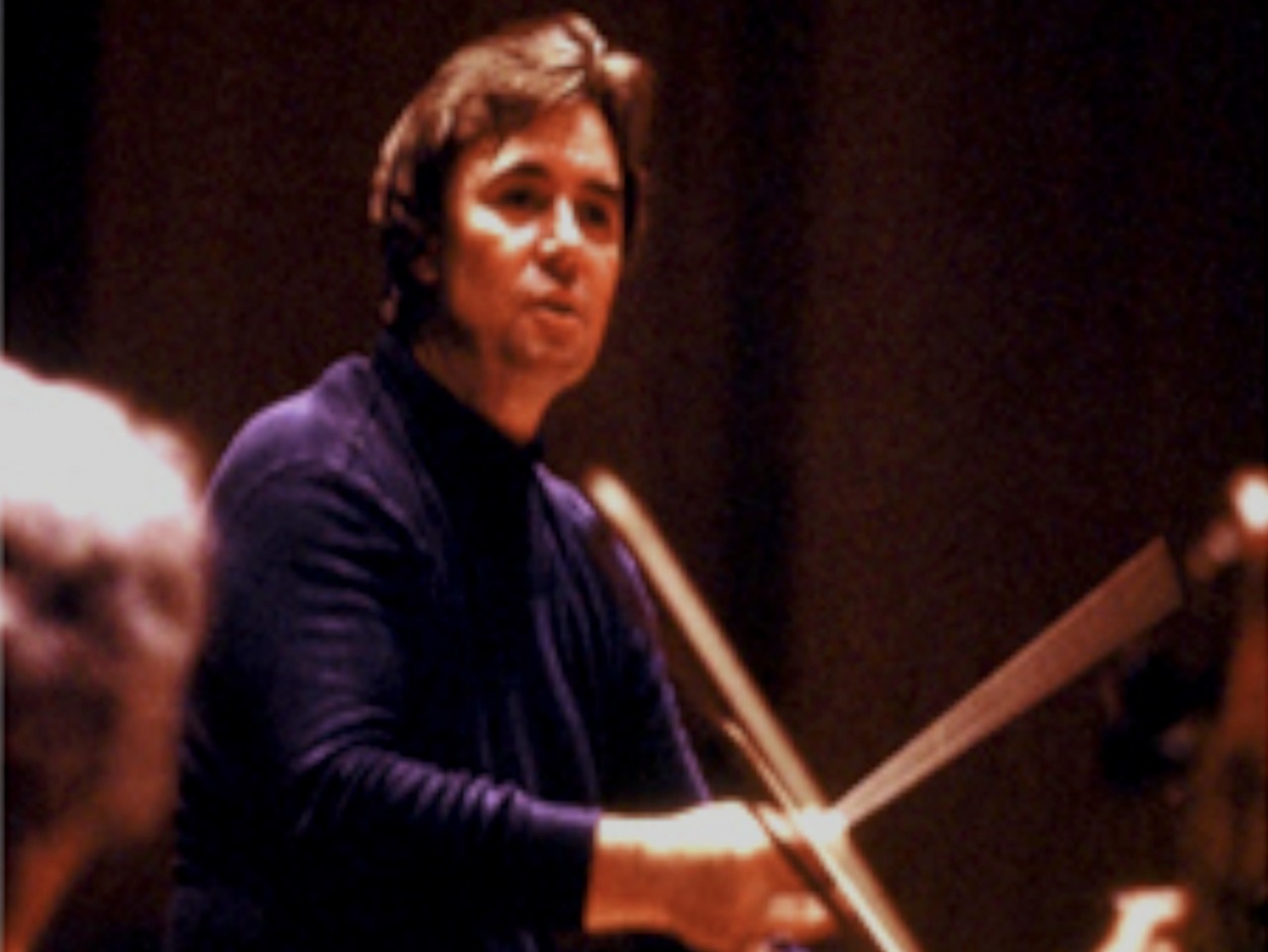 Paul conducting London's Royal Philharmonic Orchestra
